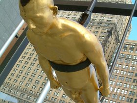28-nora-gold-man-bell.jpg