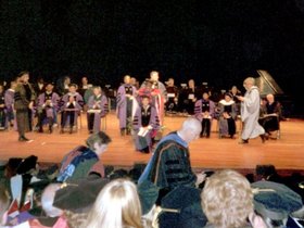 12-1745-convocation-joseph-on-stage_1.jpg